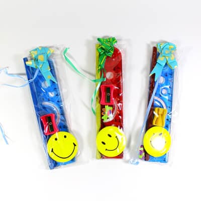 Stationary set with smiley badge